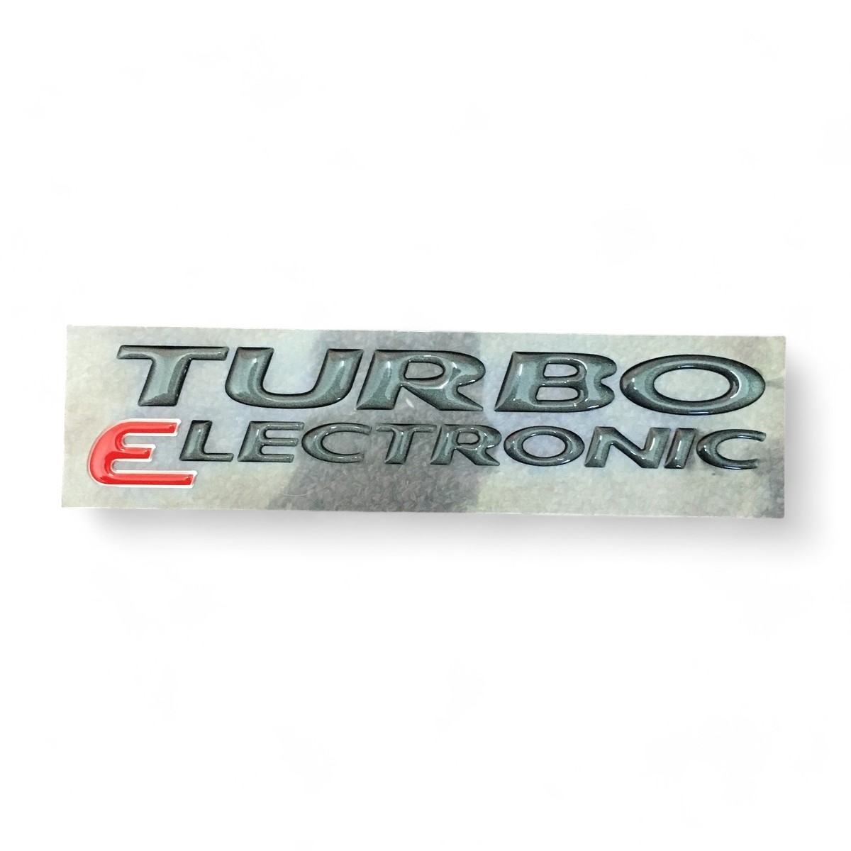93310659.jpg Emblema "turbo Electr." Tapa Trasera Gris S10 06/ - Imagen 1